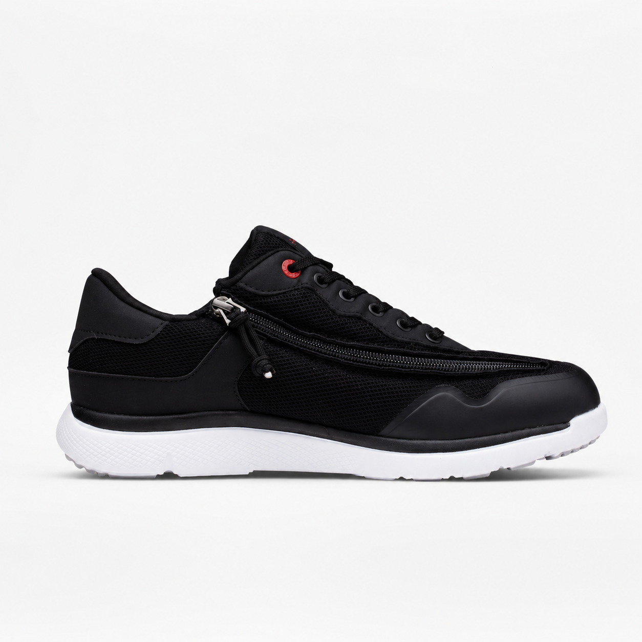 Black sneaker with a white sole on a light gray background